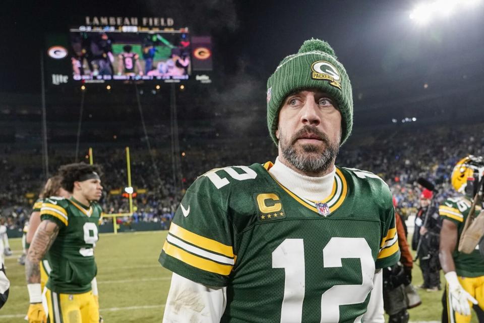 Green Bay Packers quarterback Aaron Rodgers walks off the field after a game against the Detroit Lions on Jan. 8.