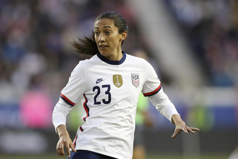 FILE - In this March 8, 2020, file photo, United States forward Christen Press looks for a pass during the second half of a SheBelieves Cup soccer match against Spain, in Harrison, N.J. Press says she wants to honor Kobe Bryant by playing for Manchester United wearing a No. 24 jersey. The American's usual No. 23 was already taken when she signed for a season with the English club earlier in September, 2020. (AP Photo/Steve Luciano, File)