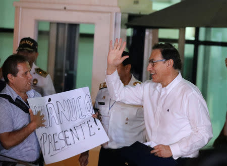 Peru's Vice President Martin Vizcarra salutes supporters after arriving in Lima, Peru March 23, 2018. REUTERS/Guadalupe Pardo