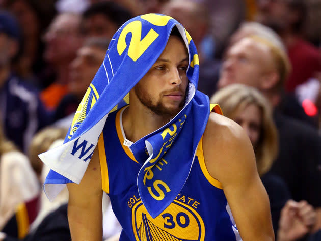 Stephen Curry, about to sit. (Getty Images)