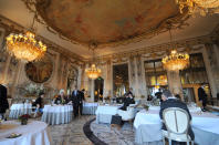 <p>Another stunning gem belonging to <a rel="nofollow noopener" href="http://www.alain-ducasse.com/en/restaurant/restaurant-le-meurice-alain-ducasse" target="_blank" data-ylk="slk:Alain Ducasse;elm:context_link;itc:0;sec:content-canvas" class="link ">Alain Ducasse</a>, this restaurant at Hotel Le Meurice was designed by Philippe Starck. Inside you'll find a traditional atmosphere (think grand chandeliers and painted ceilings) accented by modern furniture. For example, the white leather Knoll Armchairs are re-editions of the Tulip d'Eero Saarinen model. </p>