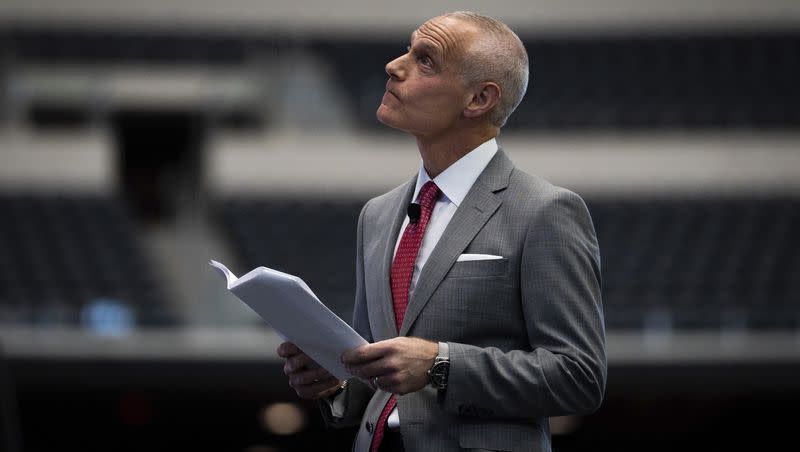 Big 12 commissioner Brett Yormark watches a new promotional video at the opening of the Big 12 football media days in Arlington, Texas, Wednesday, July 12, 2023.