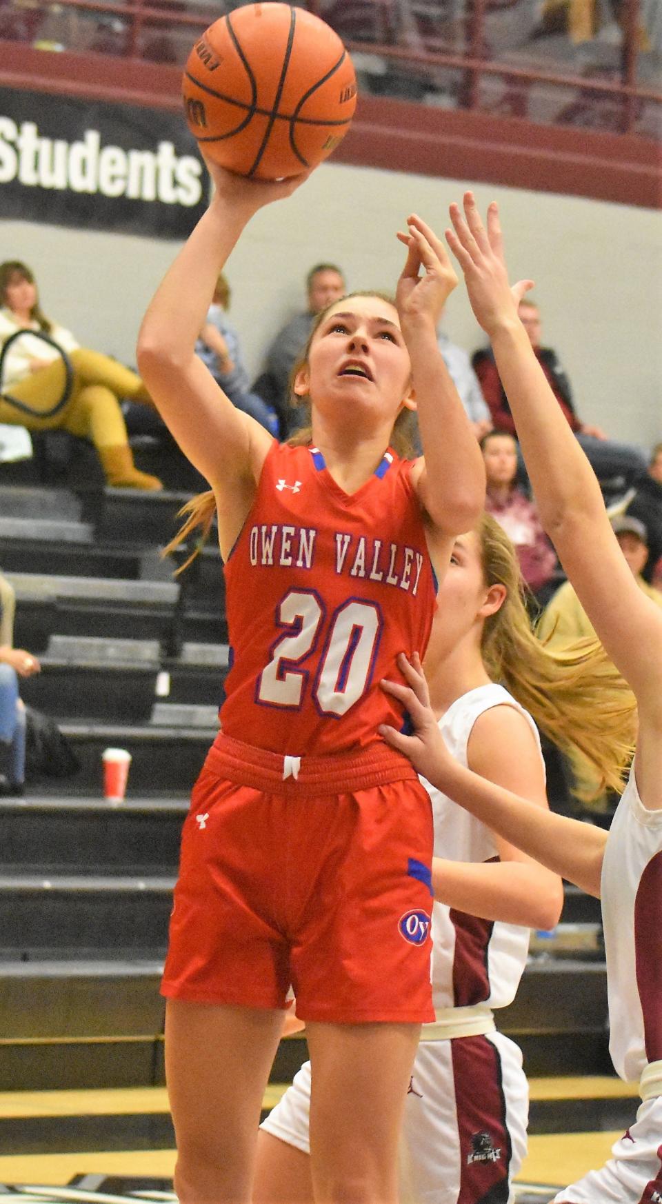 Junior forward Madi Kay drives to the hoop for two of her six points on the night.