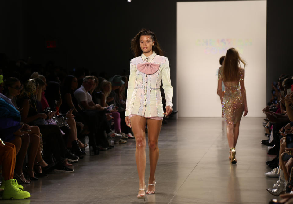 Models wear fashion from the Christian Cowan collection during Fashion Week in New York on Tuesday, Sept. 10, 2019. (AP Photo/Ragan Clark)