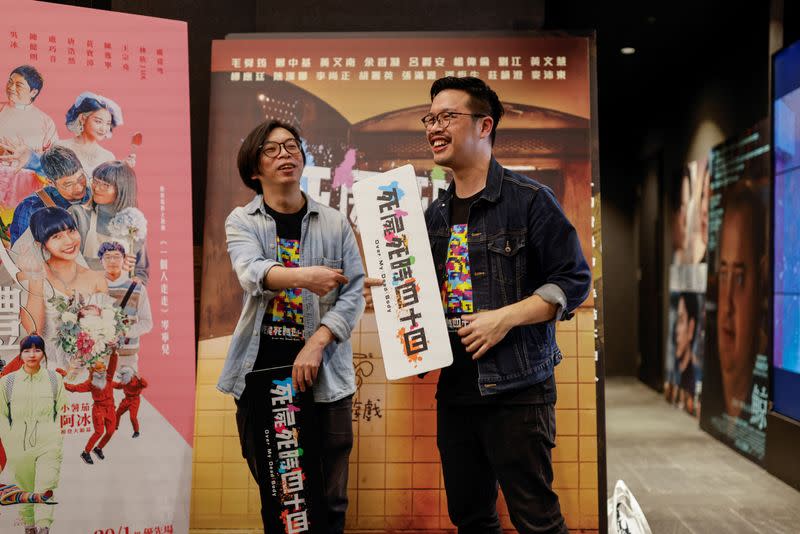 Director Ho Cheuk-Tin and actor Yeung Wai Lun react after a private screening of Ho's movie "Over My Dead Body" in Hong Kong