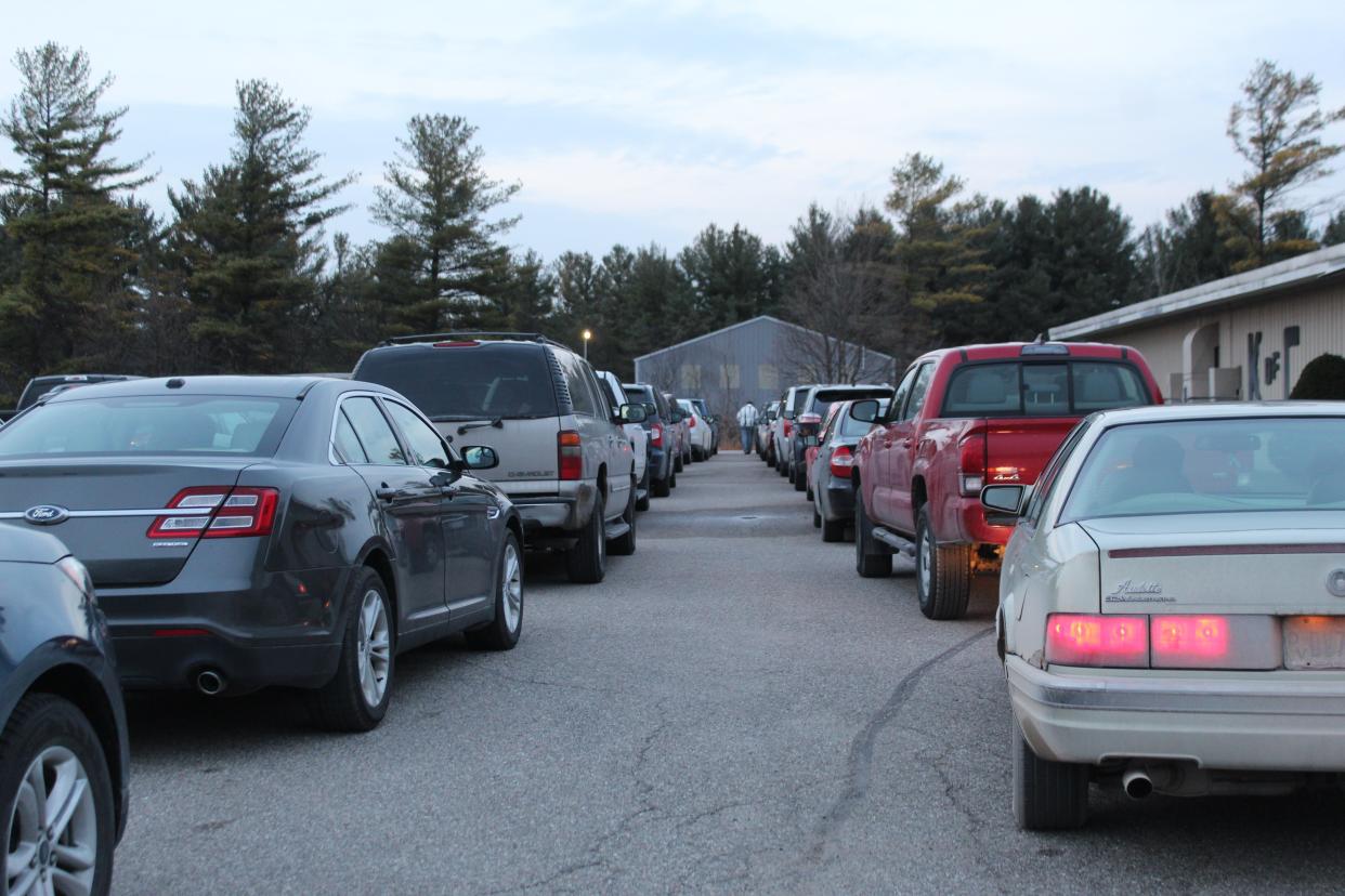 Before the event at the Knights of Columnbus Hall started last Wednesday, there were three lines of vehicles lined up, waiting to pick up a Thanksgiving dinner from the Cheboygan Salvation Army. 