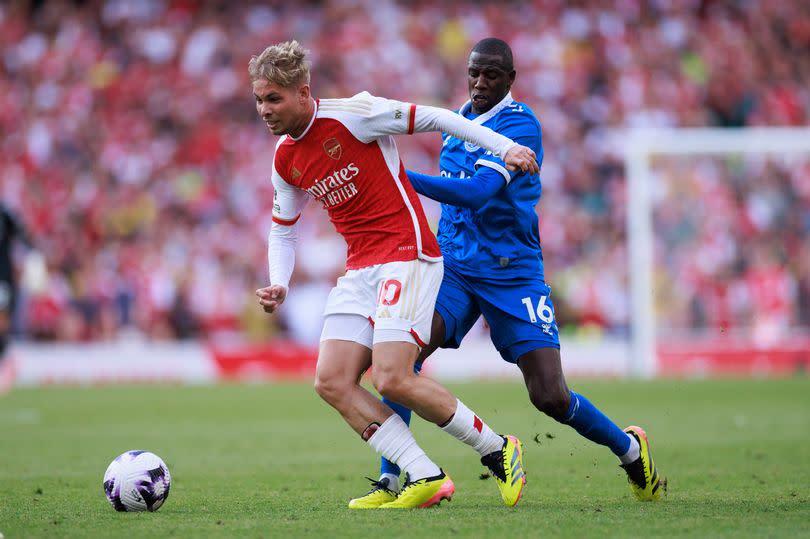Emile Smith Rowe in action with Abdoulaye Doucoure during the Premier League match between Arsenal FC and Everton FC.