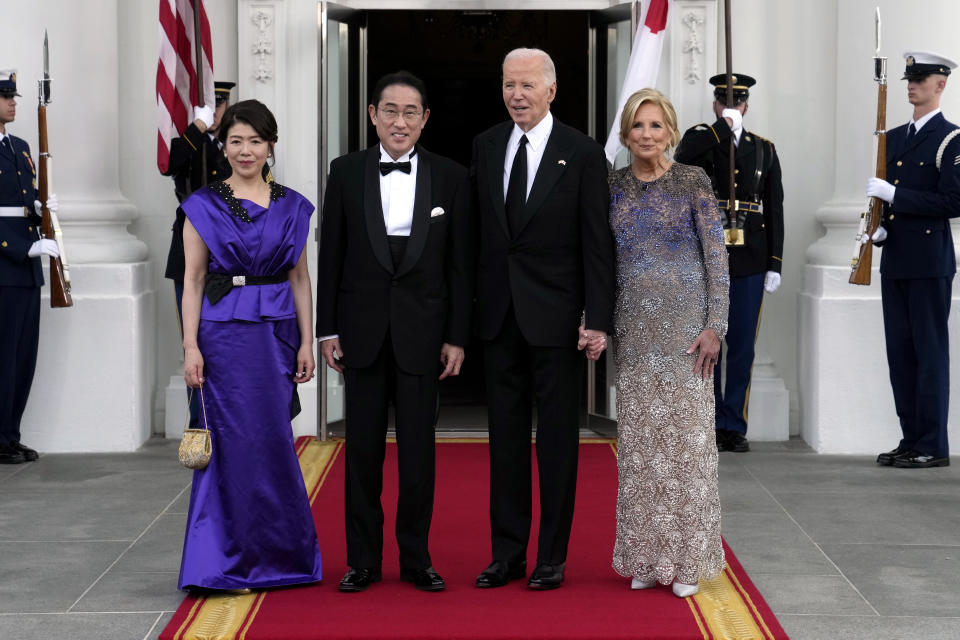 President Joe Biden, center right, and first lady Jill Biden, right, welcome Japanese Prime Minister Fumio Kishida, center left, and his wife Yuko Kishida for a State Dinner at the White House, Wednesday, April 10, 2024, in Washington. (AP Photo/Susan Walsh)