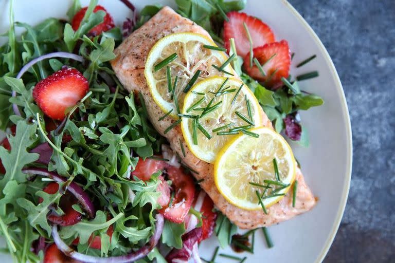 <p>This is everything we want in a summer meal: Fast, easy and super fresh.</p><p>Get the <a href="https://www.delish.com/uk/cooking/recipes/a32487382/roasted-salmon-with-strawberry-recipe/" rel="nofollow noopener" target="_blank" data-ylk="slk:Roasted Salmon with Strawberry-Rocket Salad;elm:context_link;itc:0;sec:content-canvas" class="link ">Roasted Salmon with Strawberry-Rocket Salad</a> recipe.</p>