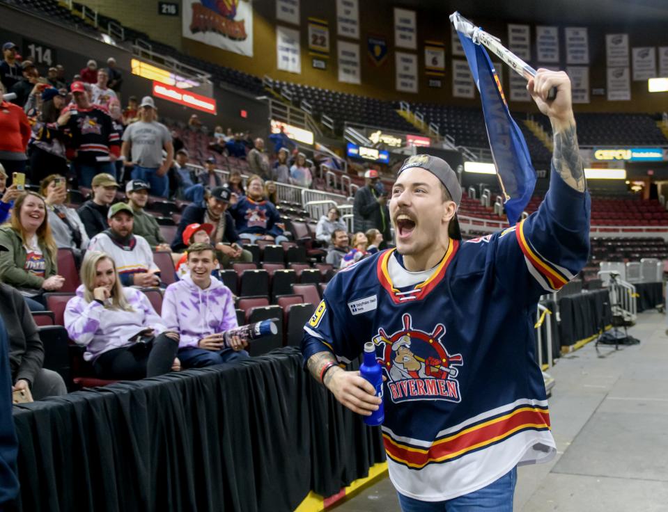 Peoria Rivermen defenseman Zach Wilkie pumps up the crowd before the start of a ceremony celebrating the team's SPHL championship Friday, May 6, 2022 at the Peoria Civic Center.