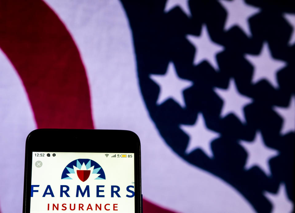 KIEV, UKRAINE - 2018/12/20:  In this photo illustration, the Farmers Insurance Group logo seen displayed on a smartphone. (Photo Illustration by Igor Golovniov/SOPA Images/LightRocket via Getty Images)