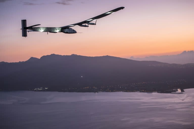 Photo provided by the Solar Impulse project on July 3, 2015 shows Solar Impulse 2, a solar-powered plane piloted by Swiss Andre Borschberg, approaching Kalaeloa Airport on Oahu, Hawaii