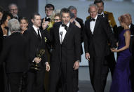 David Benioff and the cast and crew of "Game of Thrones" accept the award for outstanding drama series at the 70th Primetime Emmy Awards on Monday, Sept. 17, 2018, at the Microsoft Theater in Los Angeles. (Photo by Chris Pizzello/Invision/AP)