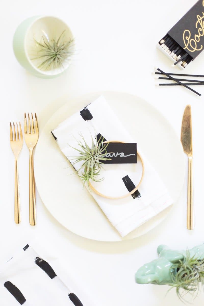 an air plant embroidery hoop place card, a great baby shower idea