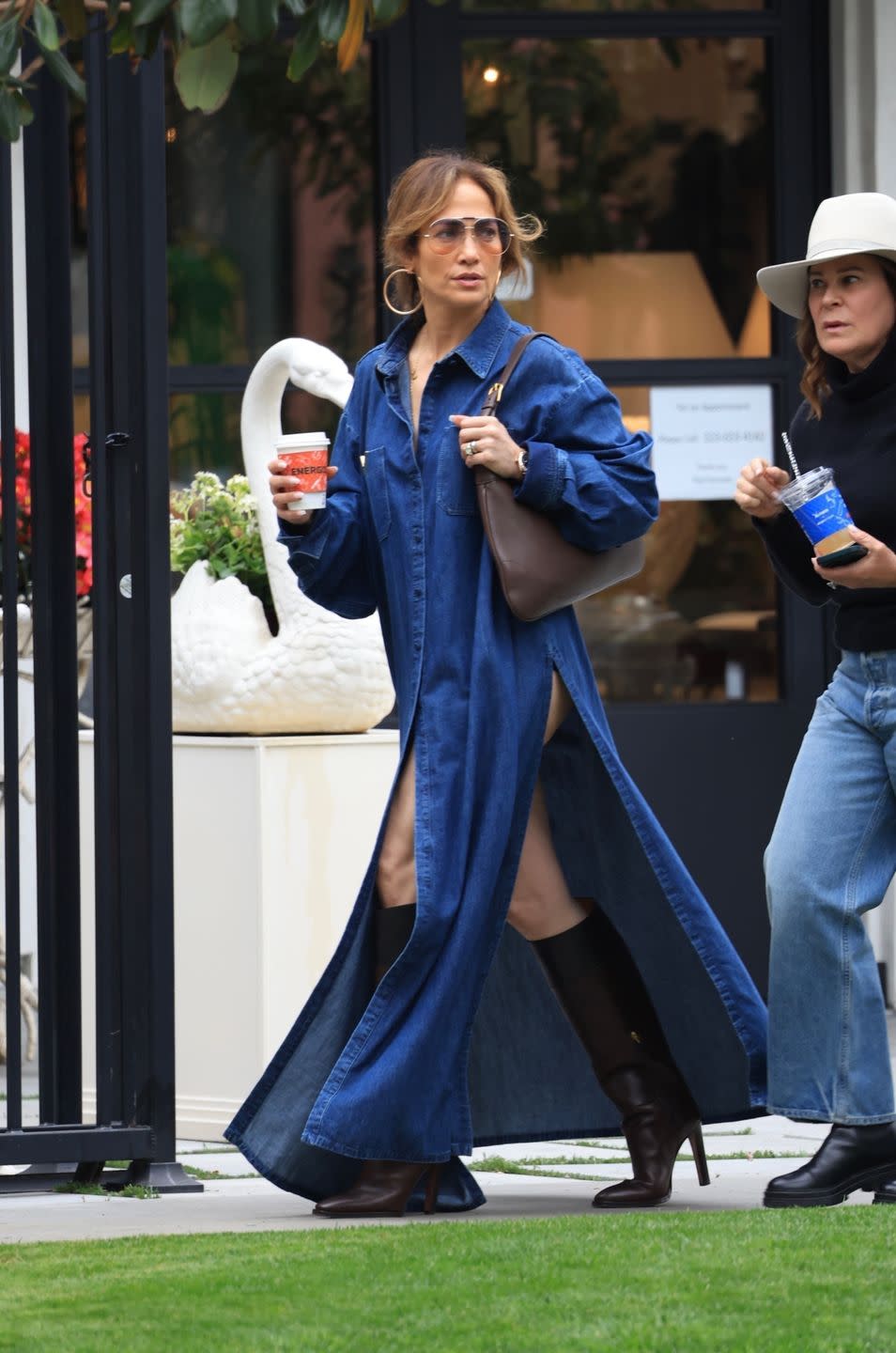 jennifer lopez in a denim leg slit dress