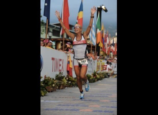 At age 57, Laura Sophiea has been selected by <a href="http://www.usatriathlon.org/" target="_hplink">USA Triathlon</a> as this year's "Grand Master," based on her performance as compared to other female triathletes over 55. She has completed four triathlons this year to date, and is currently the top woman in the 55-to-59 age group.    "I think what motivates me is my love of racing, competing, great fitness and [the] health that comes with being in shape," she told <em>Huff/Post50</em> in an email.  "I was a cheerleader in high school and never participated in sports and when I found this, I found my passion and have continued in the triathlon world for 27 years now. I am looking forward to continuing to race, compete and break age group records into my 80's!"     