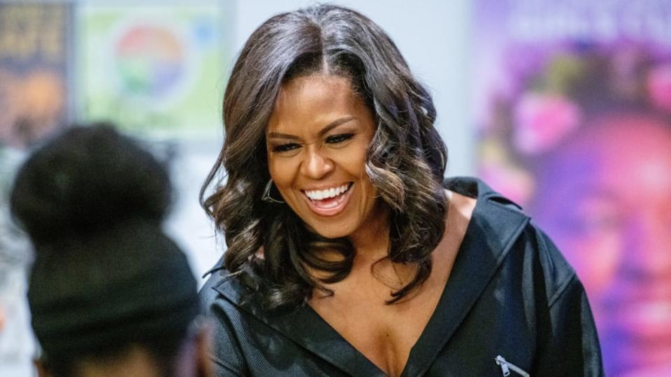 Former first lady Michelle Obama visits New York City’s Lower Eastside Girls Club in December 2018 to meet and greet the members and discuss her book “Becoming.” She is now promoting her third book, “The Light We Carry,” in a recently launched podcast, sharing details of her family’s experience in the White House. (Photo: Roy Rochlin/Getty Images)