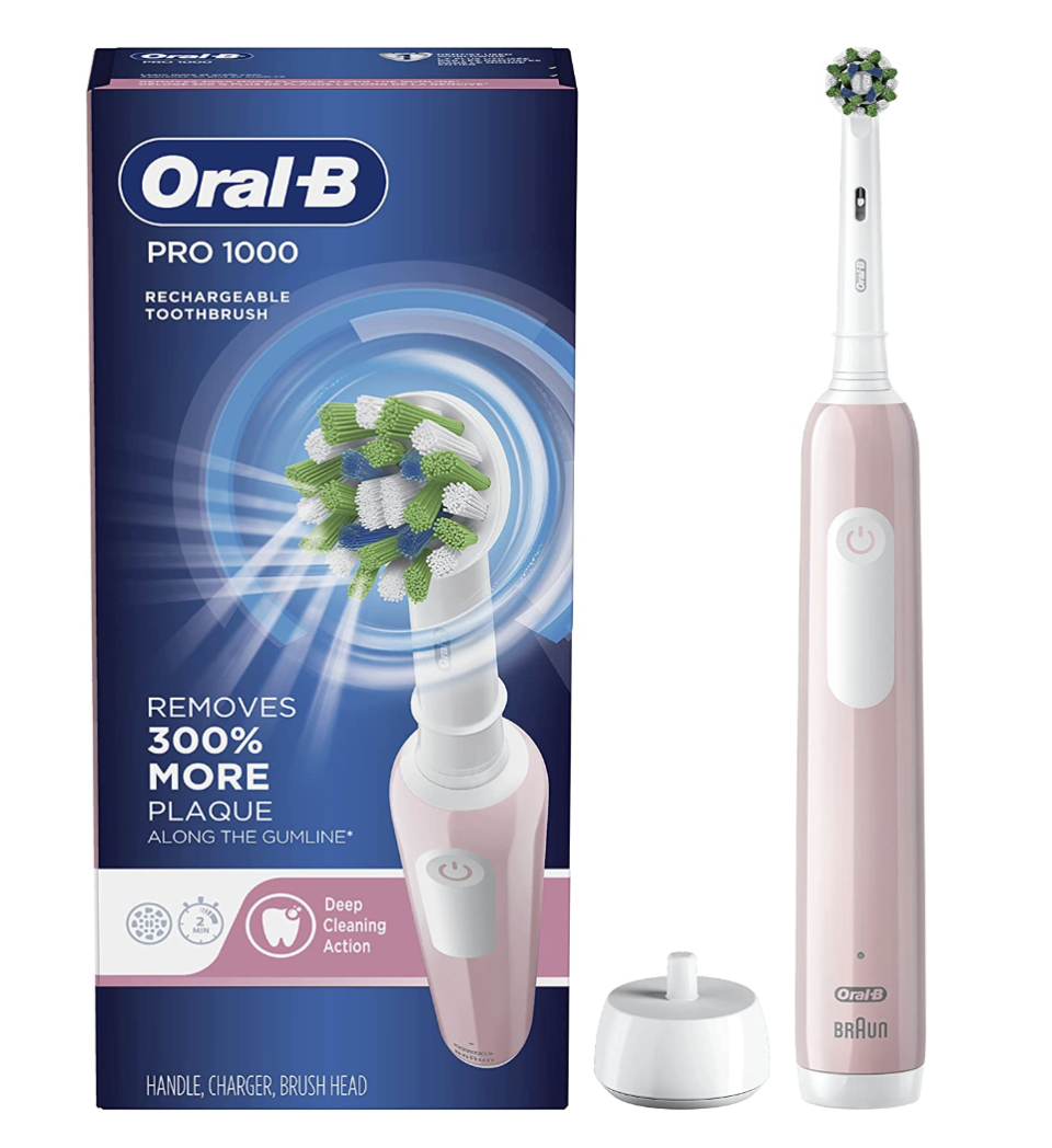 Oral B Pro 1000 Electric Toothbrush in pink with blue box  (Photo via Amazon)