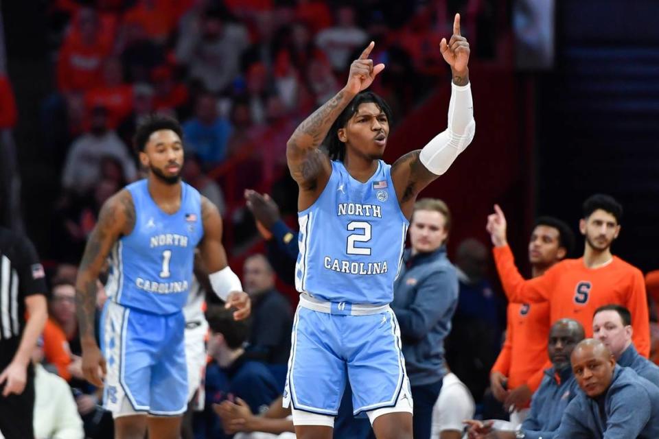 North Carolina guard Caleb Love (2) reacts during the second half of the team’s NCAA college basketball game against Syracuse in Syracuse, N.Y., Tuesday, Jan. 24, 2023. (AP Photo/Adrian Kraus)