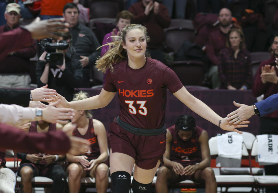 FILE - Virginia Tech's Elizabeth Kitley (33) is introduced at the start of an NCAA college basketball game against Duke in Blacksburg, Va., Thursday, Feb. 27, 2020. Kitley was named to the women's Associated Press preseason All-America team, Tuesday, Oct. 25, 2022.(Matt Gentry/The Roanoke Times via AP, File)