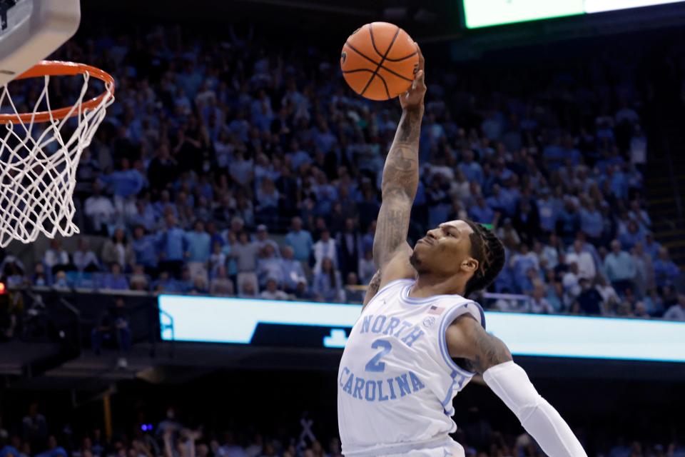North Carolina guard Caleb Love goes for a dunk against Duke during the first half of an NCAA college basketball game Saturday, March 4, 2023, in Chapel Hill, N.C. Love missed the dunk, but as fouled. (AP Photo/Chris Seward)