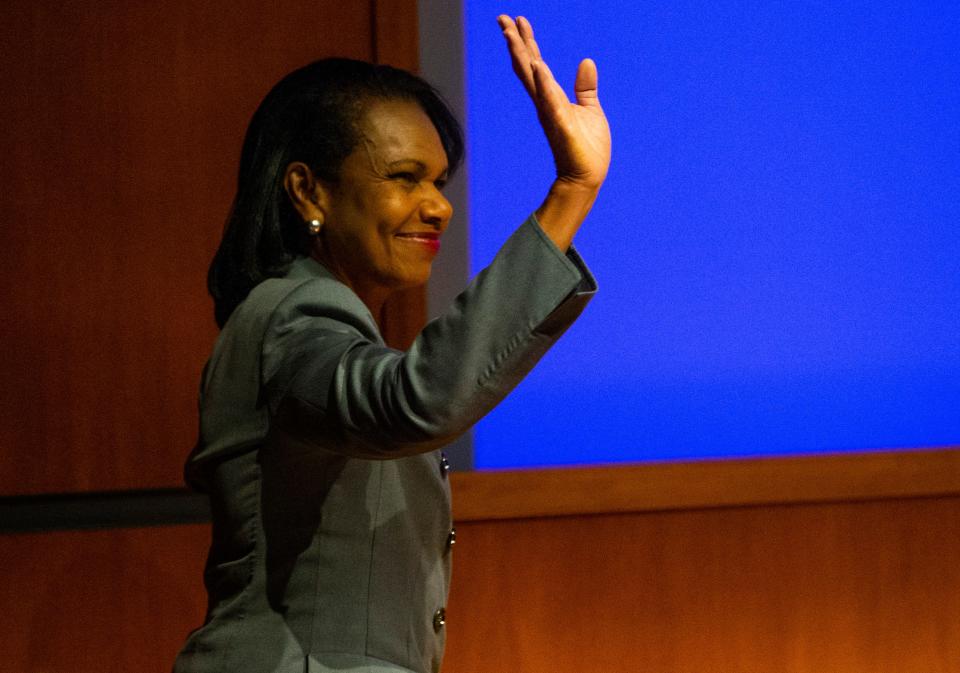 Former U.S. Secretary of State Condoleezza Rice waves to guests during the ""A Conversation With: Condoleezza Rice" event Thursday, April 28, 2022 at the Mendoza College of Business on campus at Notre Dame in South Bend. 