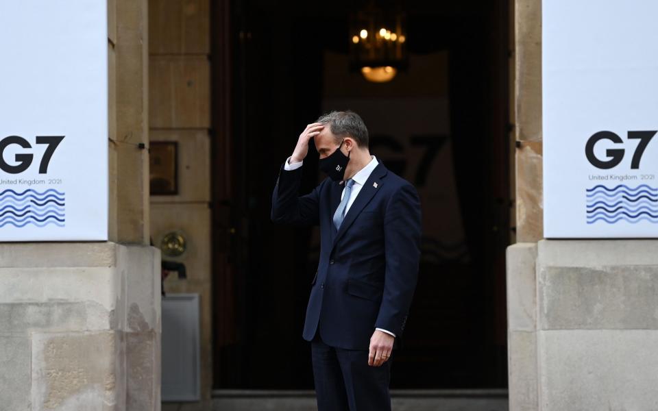 Foreign Secretary Dominic Raab awaiting he arrivals of delegates at Lancaster House on Wednesday morning - ANDY RAIN/POOL/EPA-EFE/Shutterstock