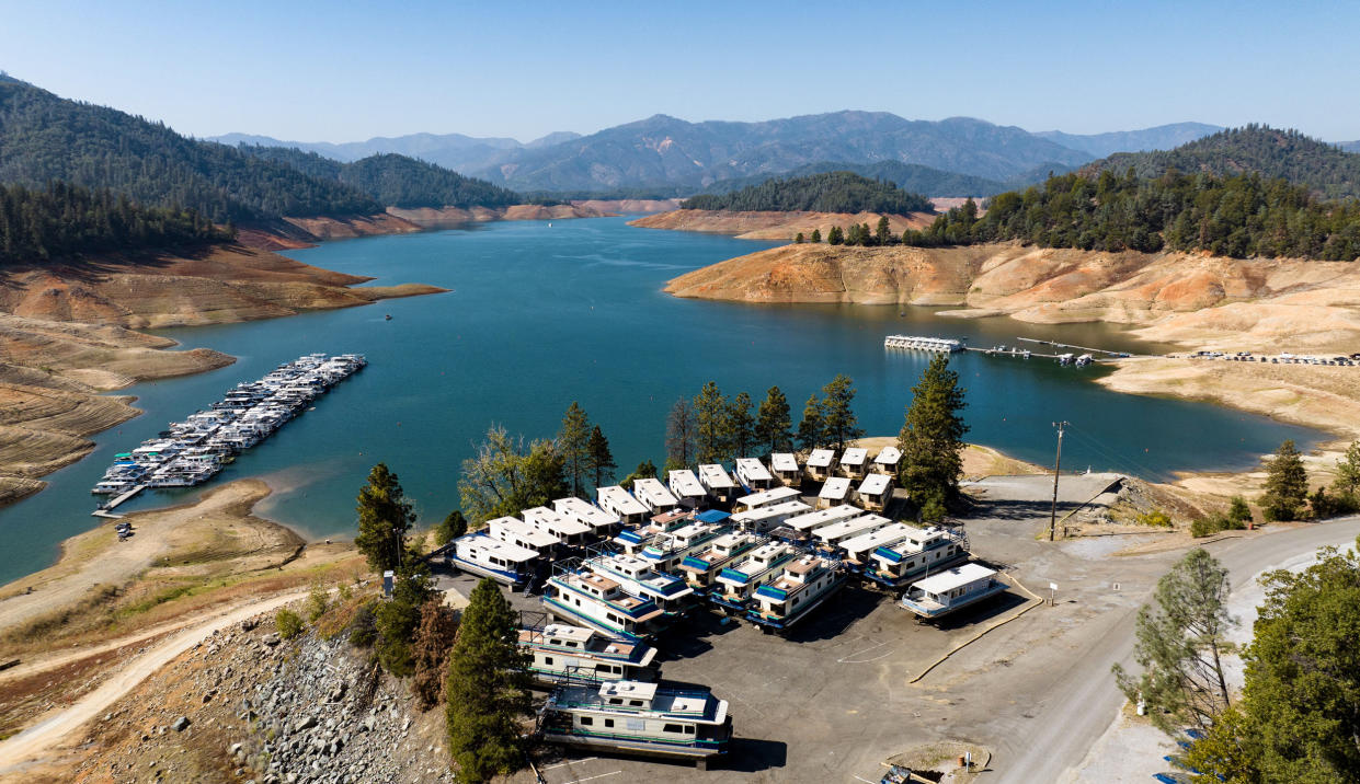 Houseboats are parked out of the water at a Shasta Lake marina in Lakehead, Calif., on Oct. 16, 2022. (Josh Edelson / AFP via Getty Images file)