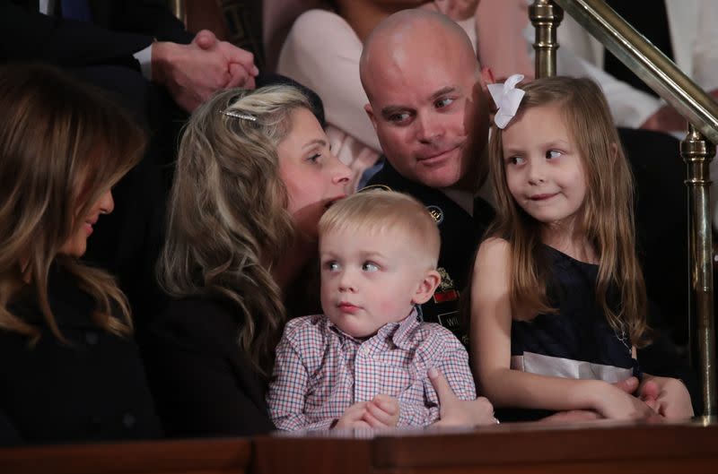 Sgt. 1st Class Townsend Williams surprises family at the State of the Union address by U.S. President Donald Trump in Washington