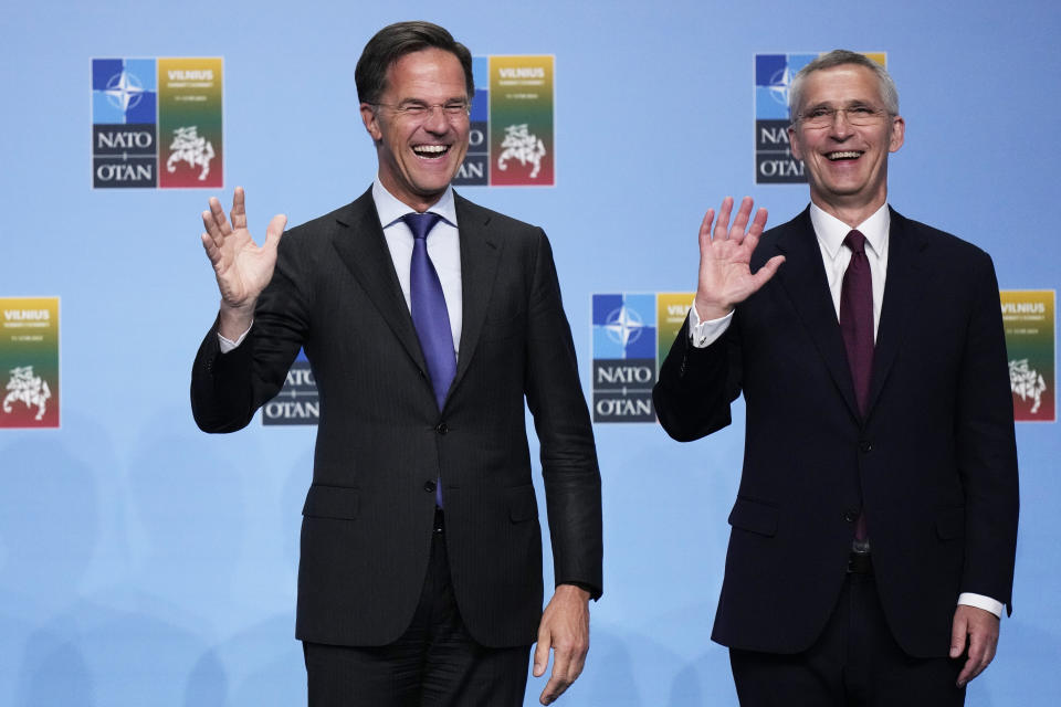 NATO Secretary General Jens Stoltenberg, right, greets Netherland?s Prime Minister Mark Rutte during arrivals for a NATO summit in Vilnius, Lithuania, Tuesday, July 11, 2023. NATO's summit began Tuesday with fresh momentum after Turkey withdrew its objections to Sweden joining the alliance, a step toward the unity that Western leaders have been eager to demonstrate in the face of Russia's invasion of Ukraine. (AP Photo/Pavel Golovkin)