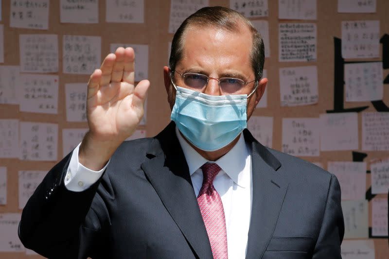 U.S. Secretary of Health and Human Services Azar waves to the media after paying his respects to the late former President of Taiwan Lee Teng-Hui at a memorial in Taipei