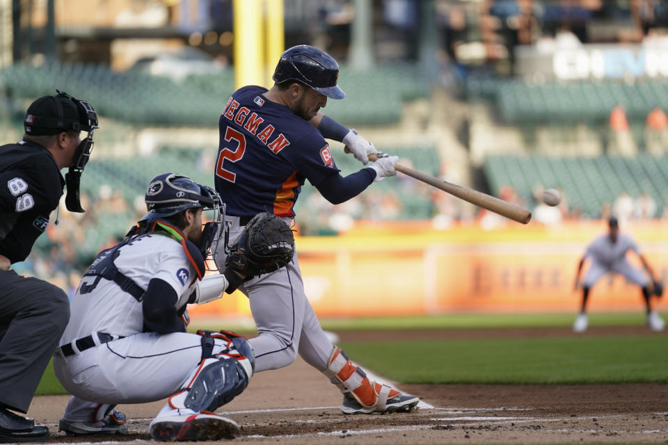 Houston Astros' Alex Bregman (2) hits a one-run single against the Detroit Tigers in the first inning of a baseball game in Detroit, Monday, Sept. 12, 2022. (AP Photo/Paul Sancya)