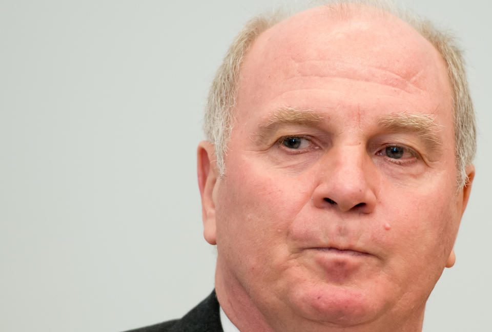 President of German soccer club Bayern Munich, Uli Hoeness, waits at a regional court in Munich, Germany, Thursday March 13, 2014. Hoeness is accused in a tax evasion case that could land the German soccer legend in prison. Bavarian prosecutors filed charges against Hoeness after he reported himself to authorities for having a previously undeclared Swiss bank account. The verdict is expected today. (AP Photo/ Sven Hoppe,Pool)