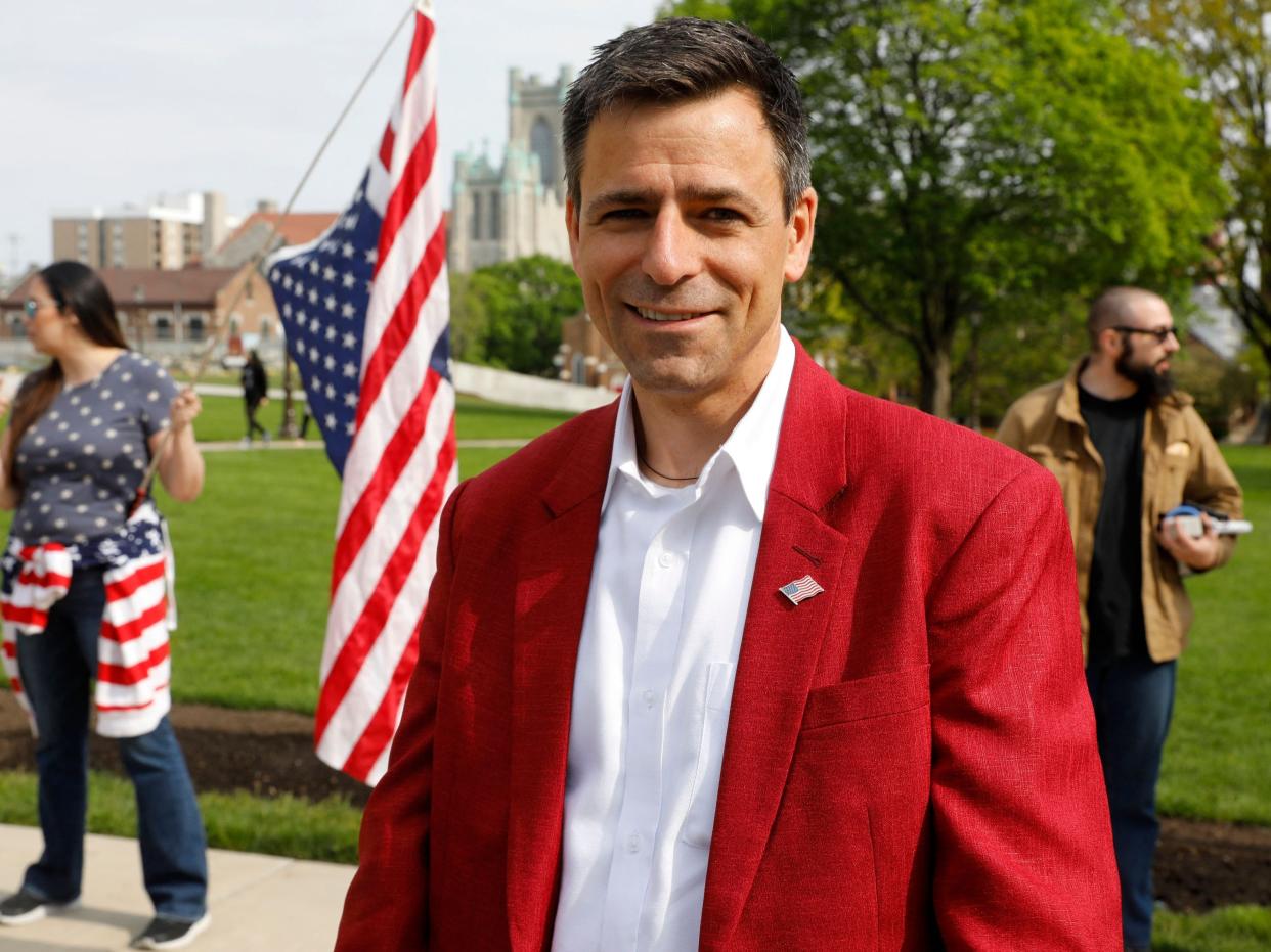 Ryan Kelly, Republication candidate for Governor, attends a Freedom Rally in support of First Amendment rights and to protest against Governor Gretchen Whitmer, outside the Michigan State Capitol in Lansing, Michigan on May 15, 2021.