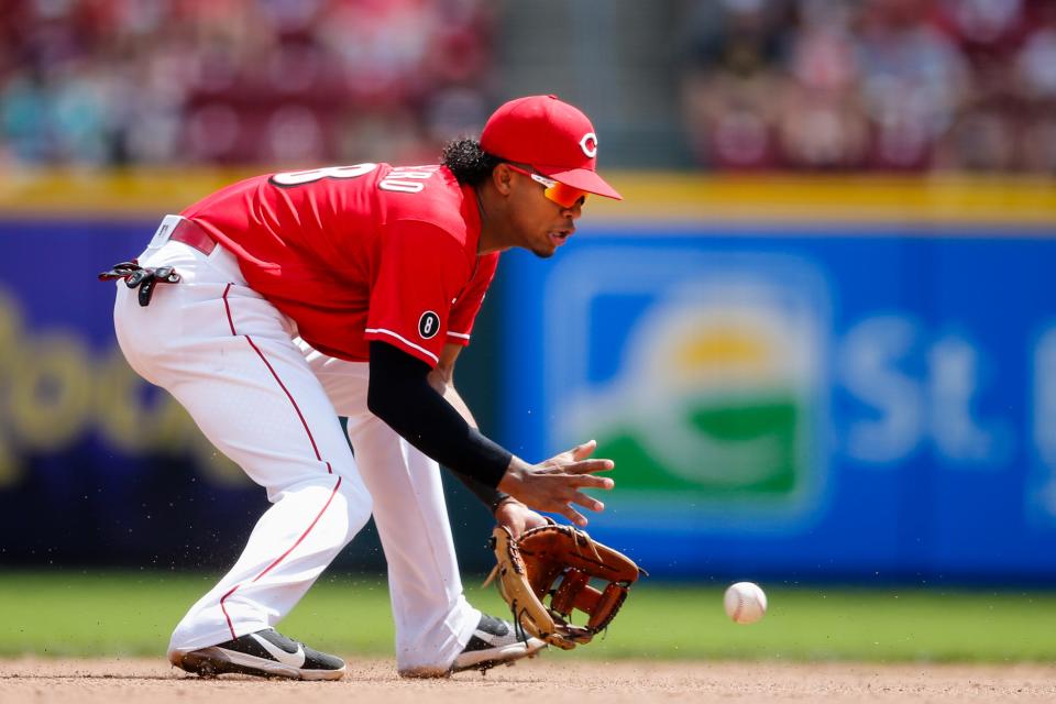 Cincinnati Reds shortstop Jose Barrero (38) stops a ground ball to make a double play in the seventh inning of the MLB National League game between the Cincinnati Reds and Chicago Cubs on Wednesday, Aug. 18, 2021, at Great American Ball Park in downtown Cincinnati.