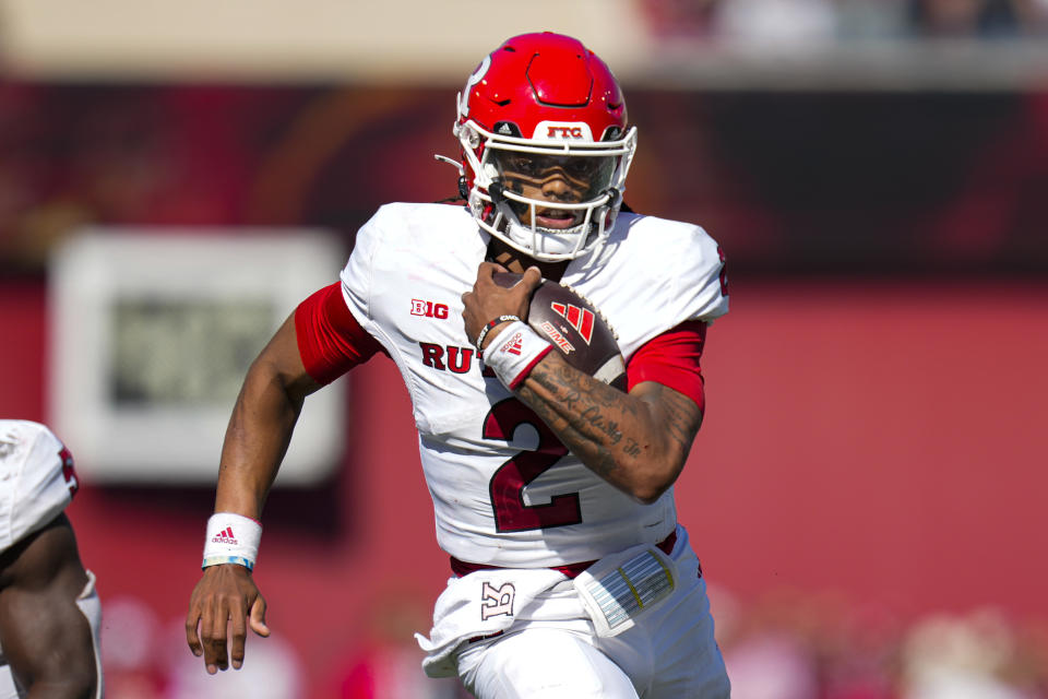 Rutgers quarterback Gavin Wimsatt (2) runs against Indiana during the first half of an NCAA college football game in Bloomington, Ind., Saturday, Oct. 21, 2023. Rutgers defeated Indiana 31-14. (AP Photo/Michael Conroy)