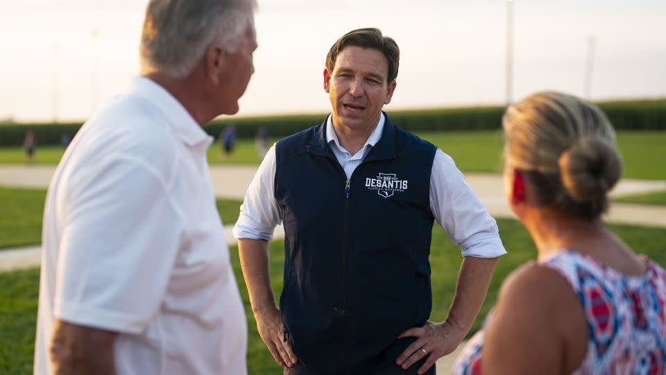 DeSantis speaks with attendees during a campaign stop at the Field of Dreams in Dyersville, Iowa, on August 24, 2023. - Al Drago/Bloomberg/Getty Images