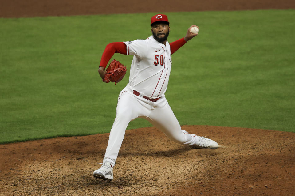 Cincinnati Reds' Amir Garrett throws during the ninth inning of a baseball game against the Pittsburgh Pirates in Cincinnati, Monday, April 5, 2021. (AP Photo/Aaron Doster)