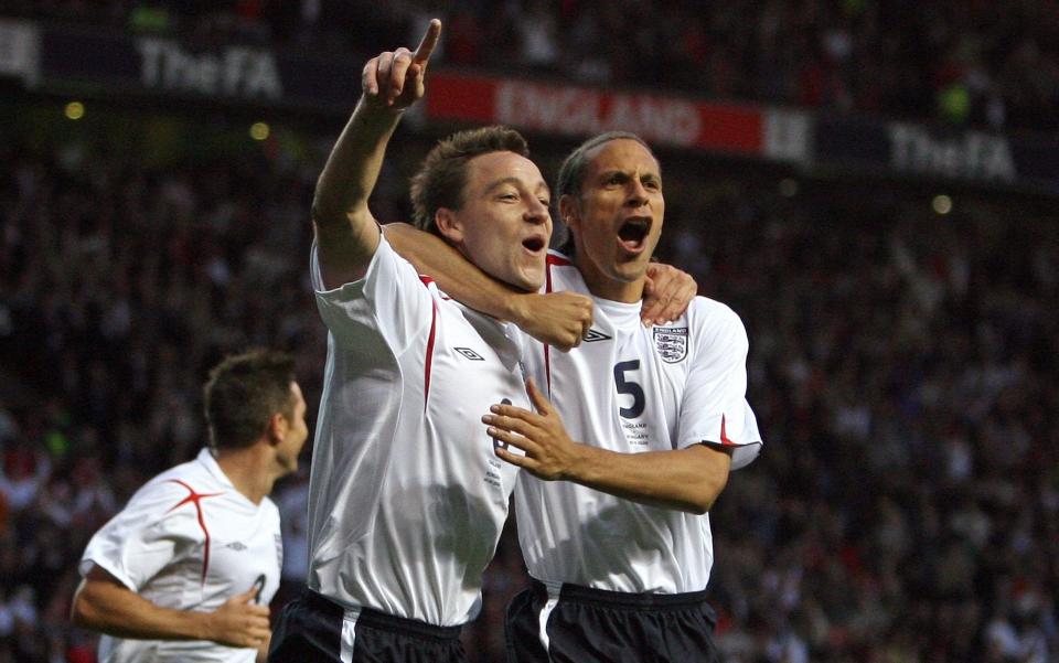 England's Terry celebrates with Ferdinand after scoring during international friendly soccer match between England and Hungary in Manchester...Englands' John Terry (L) celebrates with Rio Ferdinand (R) after scoring during the international friendly soccer match between England and Hungary at Old Trafford, Manchester - REUTERS