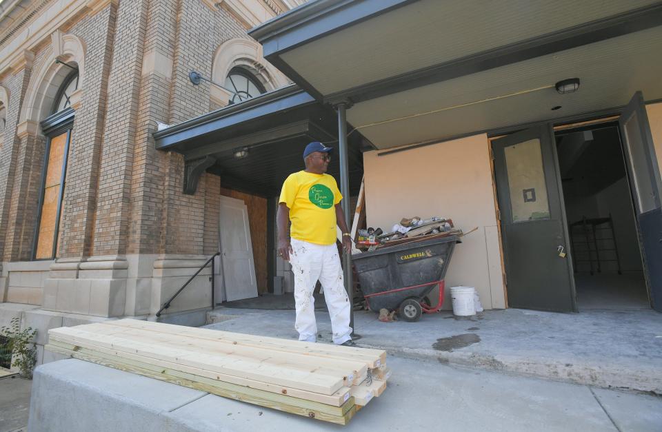 Terry Gamble of Positive Outlook Painting works around construction at the Historic Post Office at 401 North Main Street in Anderson, S.C. Friday, October 13, 2023.