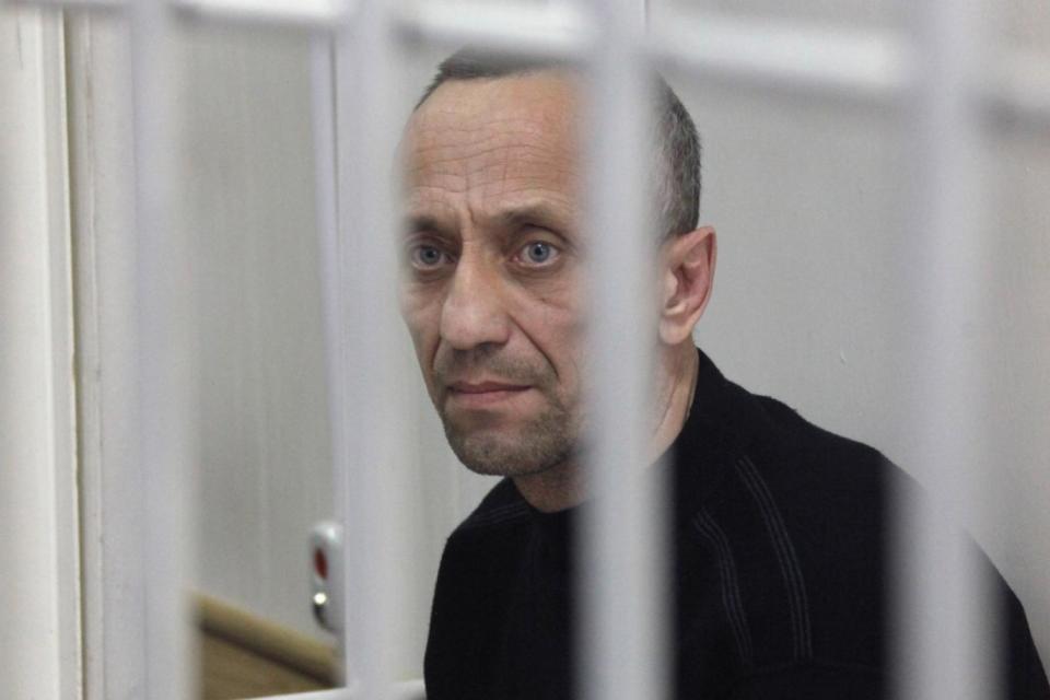 Former police officer Mikhail Popkov during a verdict announcement at the Irkutsk Regional Court in the city of Irkutsk, eastern Siberia, Russia in January 2015. (EPA)