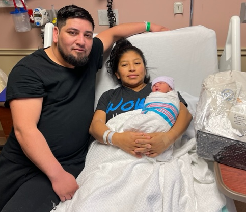 Edelmira González Pérez and Ronald Urizar Godoy, of Paterson, with their baby boy, Jared, at Hackensack University Medical Center on Jan. 1.