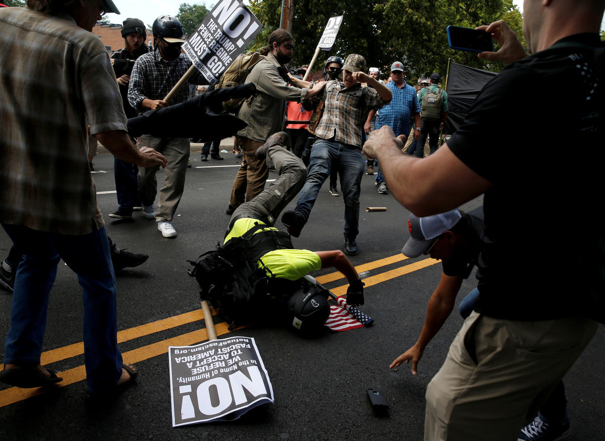 A&nbsp;white supremacist fights with counter-protesters in Charlottesville, Virginia, on&nbsp;Saturday. (Photo: Joshua Roberts / Reuters)