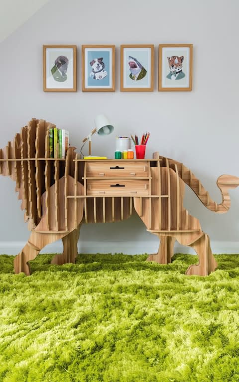 A lion storage desk and grassy carpet at Berkeley’s Royal Wells Park show home, 