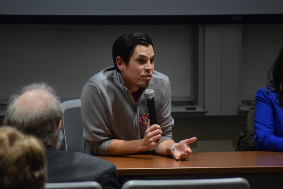 John Little, director of Native recruitment and alumni engagement at the University of South Dakota, speaks in a panel at the University of South Dakota on Nov. 2, 2021 for a conversation on Indigenous history, culture and resilience in South Dakota’s schools.