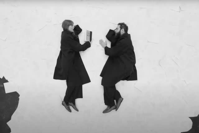 <p>Taylor Swift/ Youtube</p> Taylor Swift reads to Post Malone in "Fortnight" music video