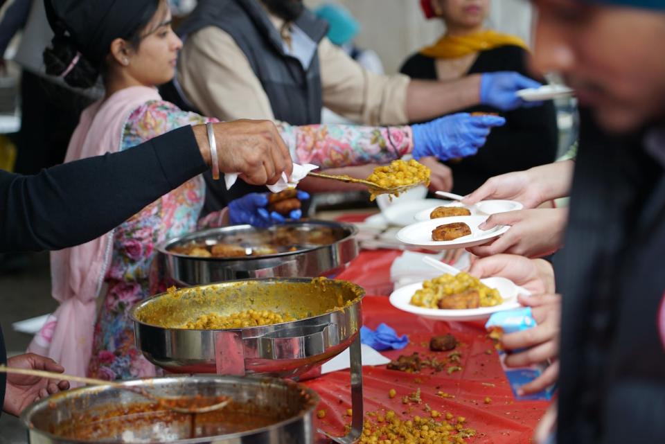 Sharing food, particularly with those who are less fortunate, is a central belief in Sikhism.