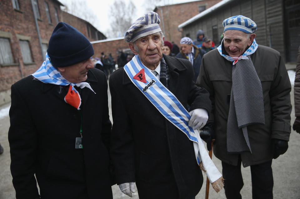 Members of an association of Auschwitz concentration camp survivors depart after laying wreaths at the execution wall at the former Auschwitz I concentration camp on January 27, 2015 in Oswiecim, Poland. International heads of state, dignitaries and over 300 Auschwitz survivors are attending the commemorations for the 70th anniversary of the liberation of Auschwitz by Soviet troops on 27th January, 1945. Auschwitz was among the most notorious of the concentration camps run by the Nazis during WWII and whilst it is impossible to put an exact figure on the death toll it is alleged that over a million people lost their lives in the camp, the majority of whom were Jewish.