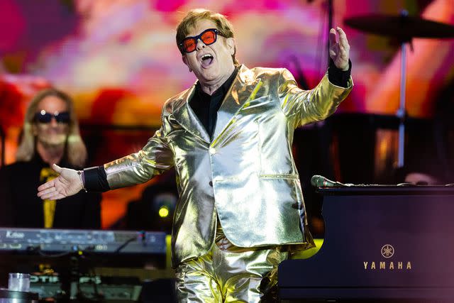 <p>Samir Hussein/WireImage</p> Elton John performs in Somerset in June 2023