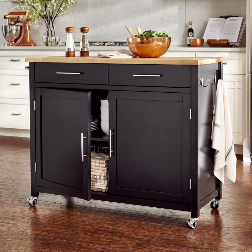 If you have a tinier kitchen, you might turn to this cart, which has storage for pots, pans and just about anything you need to get cooking. Plus, you can wheel it around whenever you want. <a href="https://fave.co/3jLoj2d" target="_blank" rel="noopener noreferrer">Originally $229, get it now for $183 at The Home Depot</a>.